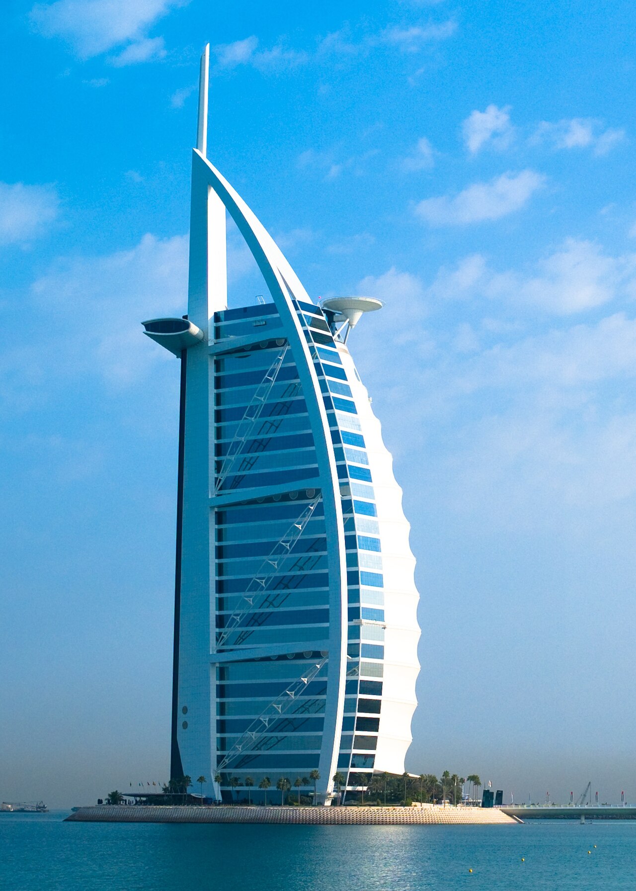 The sail-shaped Burj Al Arab hotel beside the Arabian Gulf
