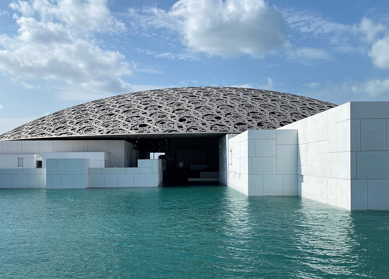 The geometric dome of Louvre Abu Dhabi on the Saadiyat Island waterfront